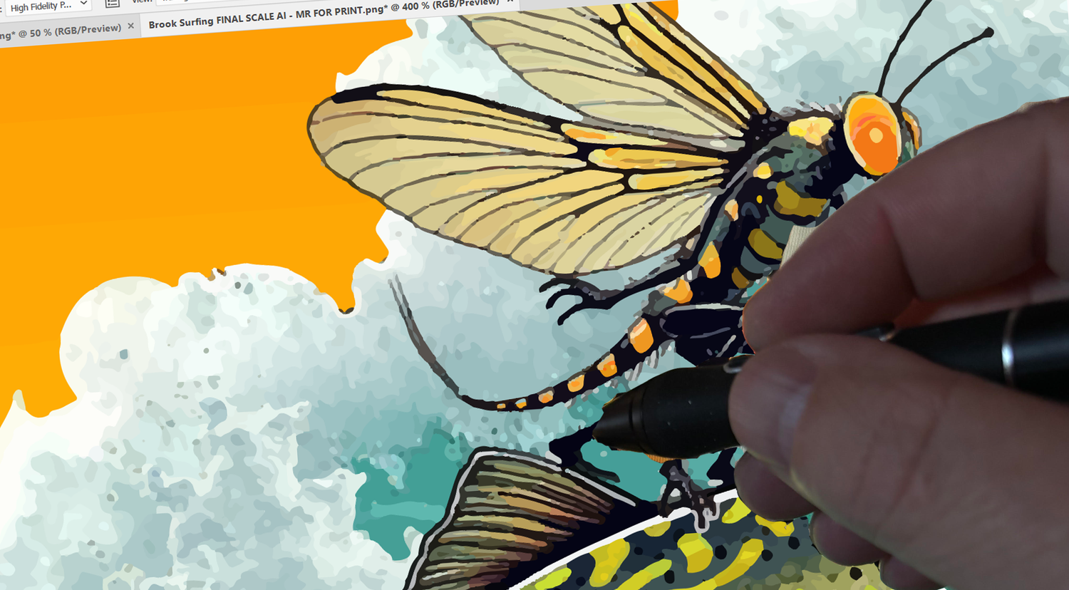 Founder of Headwater Canyon, Jeremy Moore, working on the Brook Surfing Graphic.  Picture of a man designing fly fishing art on adobe illustrator.