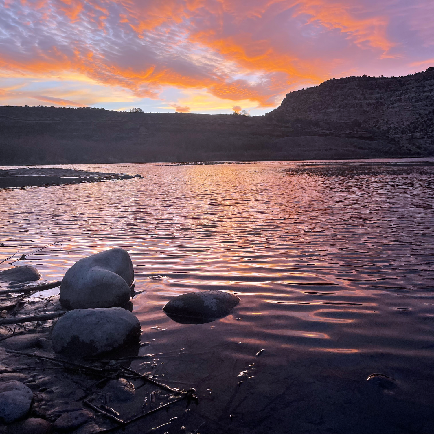 A photo of the San Juan River at sunset